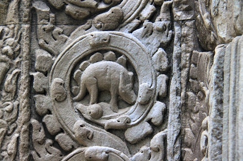 Dinosaur Carving in Ta Phrom at Angkor Archaelogical Park in Cambodia