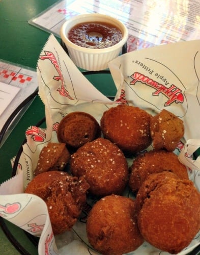 Apple fritters, mini apple muffins and apple butter are served with every meal at the Applewood Farmhouse Restaurant