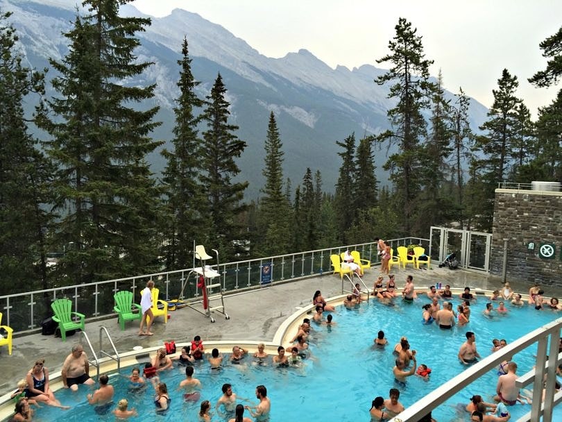 A pool with a view at Banff Hot Springs ~ 10 Incredible Hot Springs for Families
