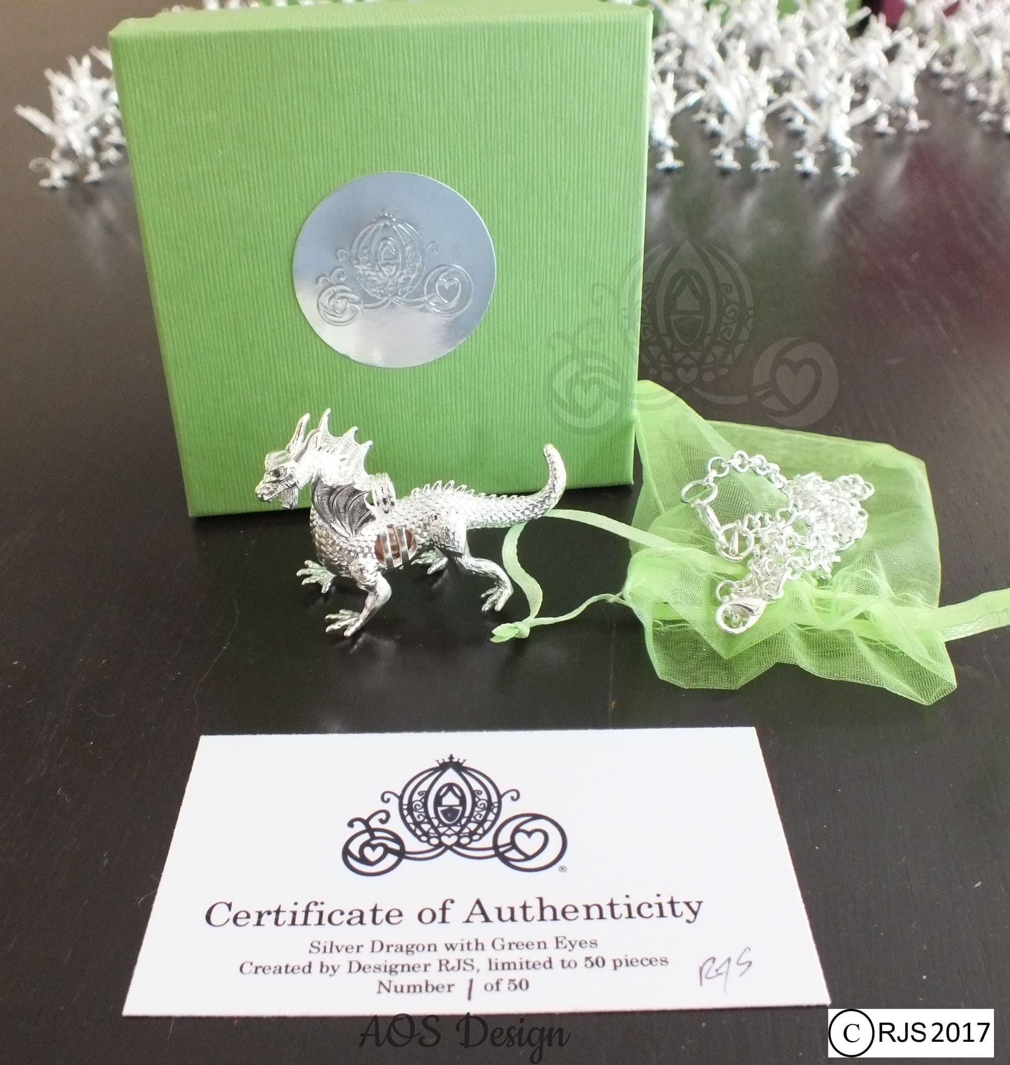 Choose from a Maleficent silver plated dragon with green crystal eyes, or with red ruby eyes ~ Find Your Own Pearl in an Oyster for Disney Jewelry