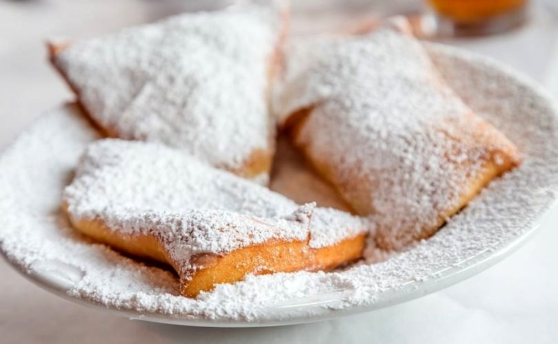 No trip to New Orleans with kids would be complete without beignets ~ New Orleans on a Budget with Kids