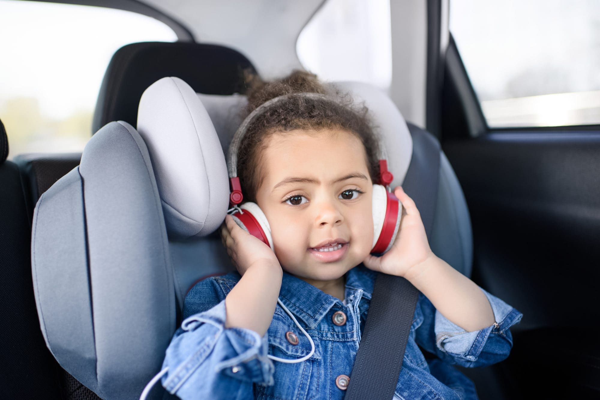 Listen to music during a road trip with a baby or toddler