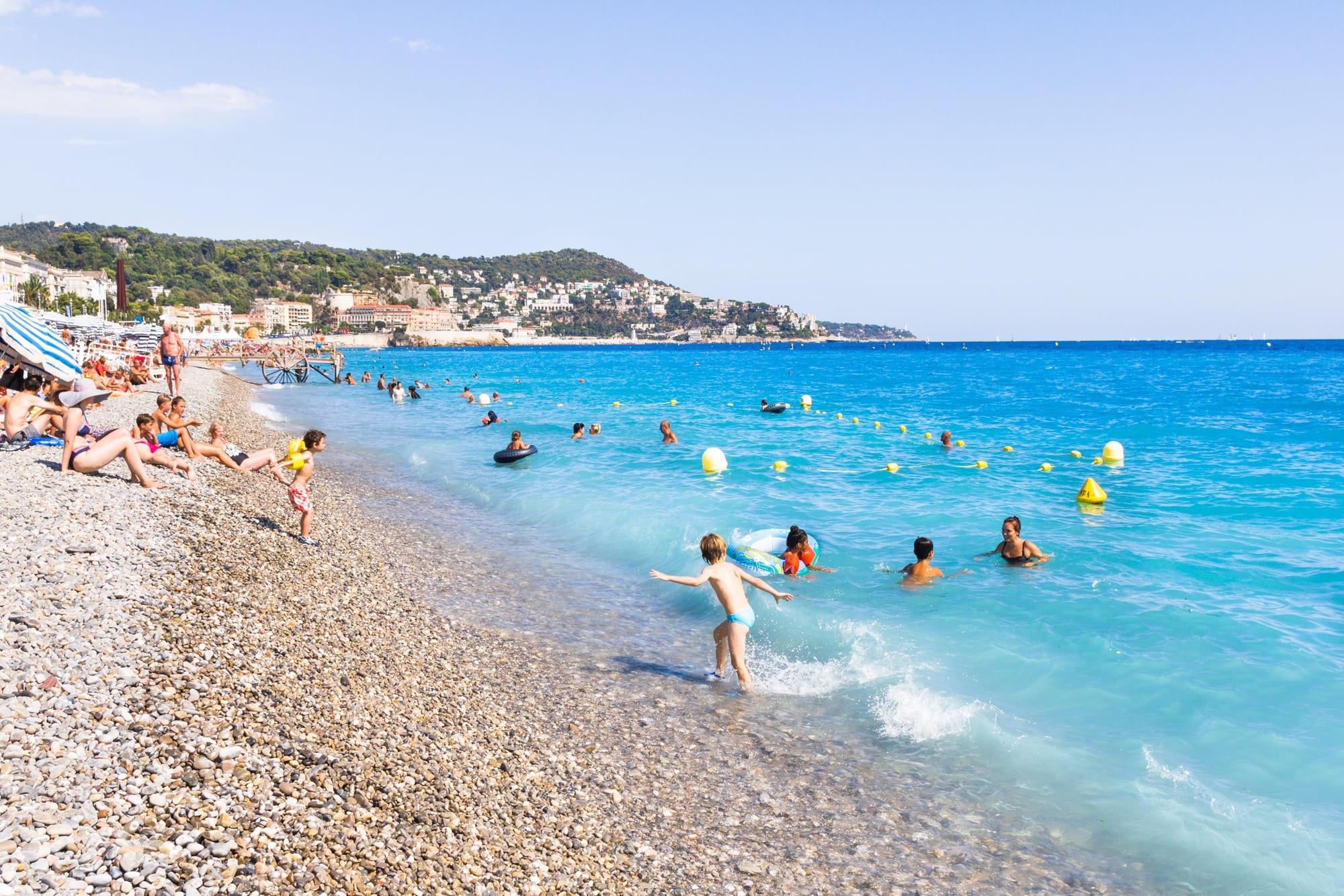 Families love playing at the beach in Nice, France ~ Best destinations in France for families