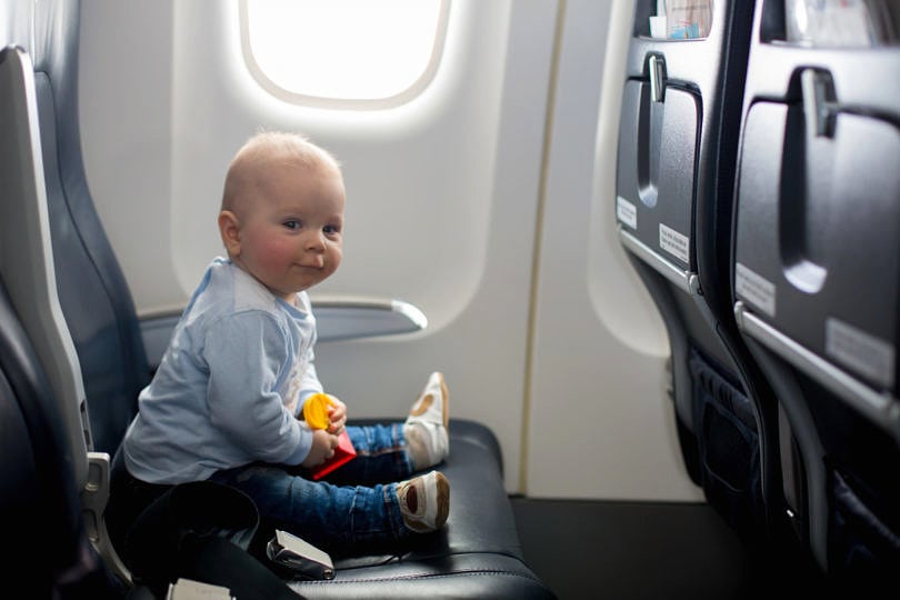 21 ESSENTIAL Tips for Flying with a Baby or Toddler