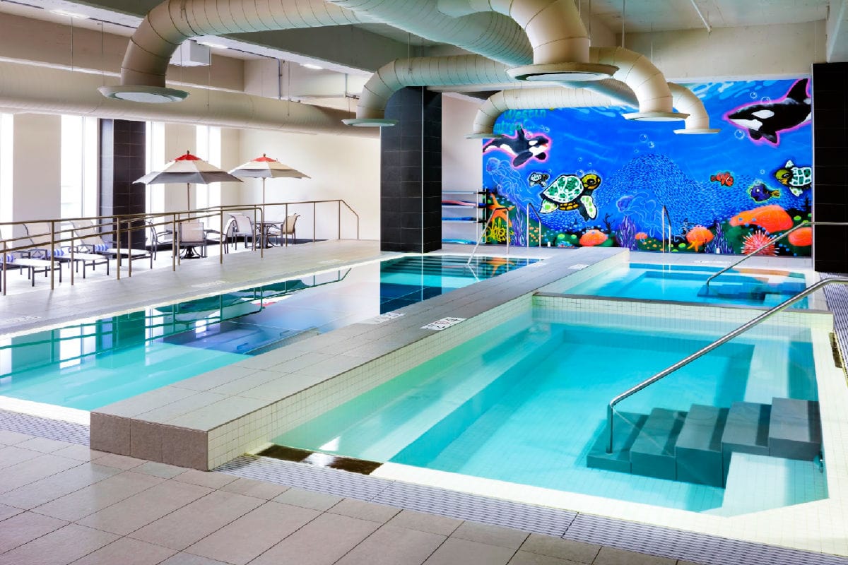The Glass-bottom pool at the Le Westin Montréal is one of the best hotel pools in Canada for families