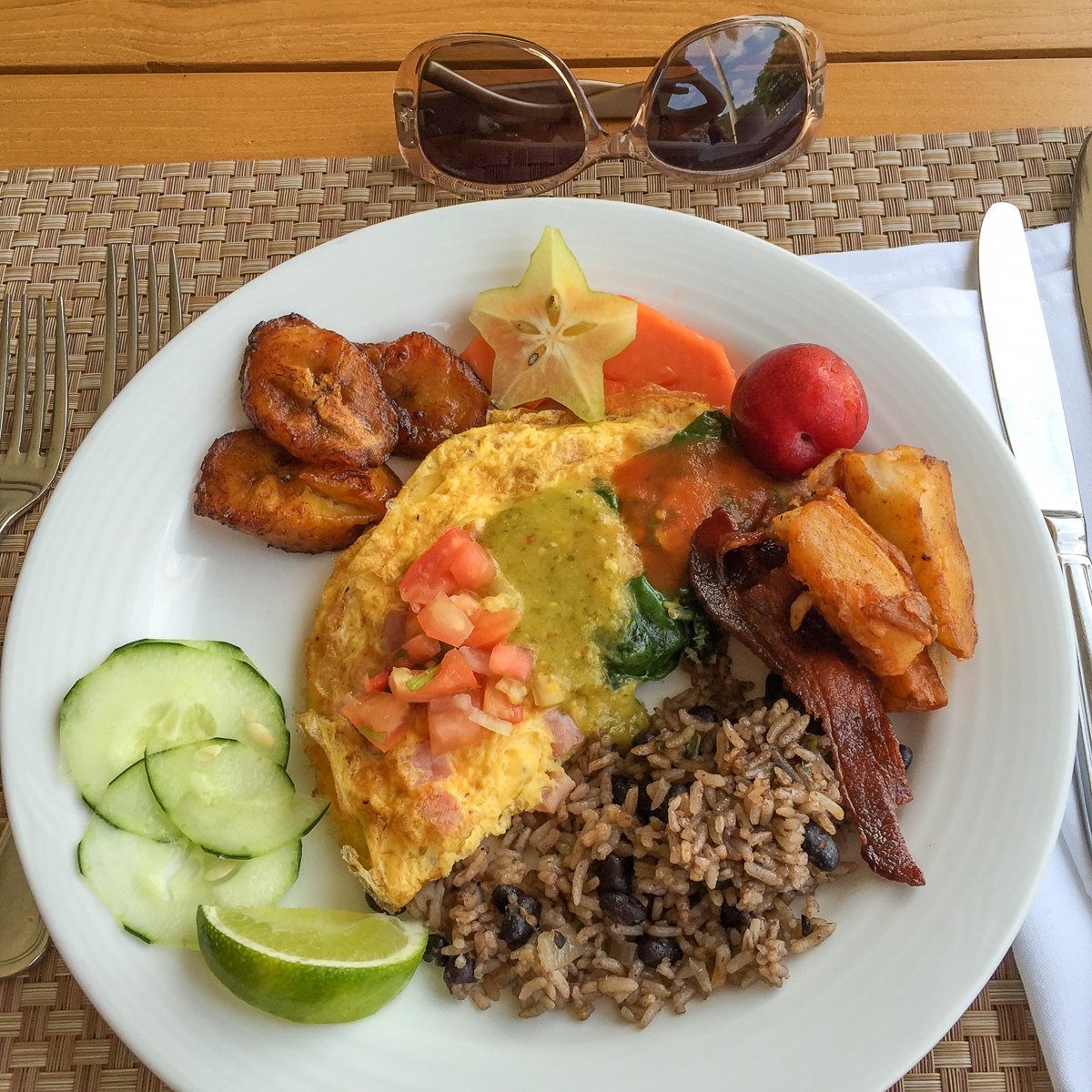 Breakfast with fresh fruit, made-to-order omelette and fried plantains at World Café