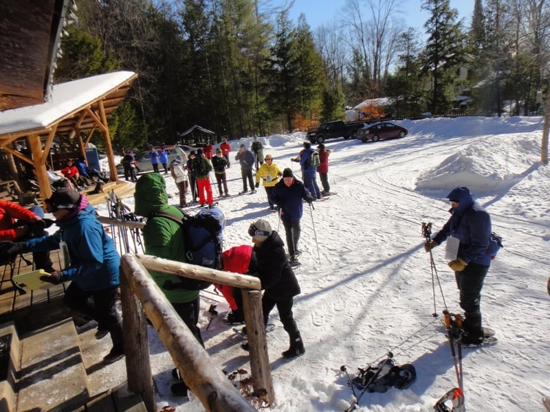 Snowshoeing tour at Natural Stone Bridge & Caves in the Adirondacks with kids