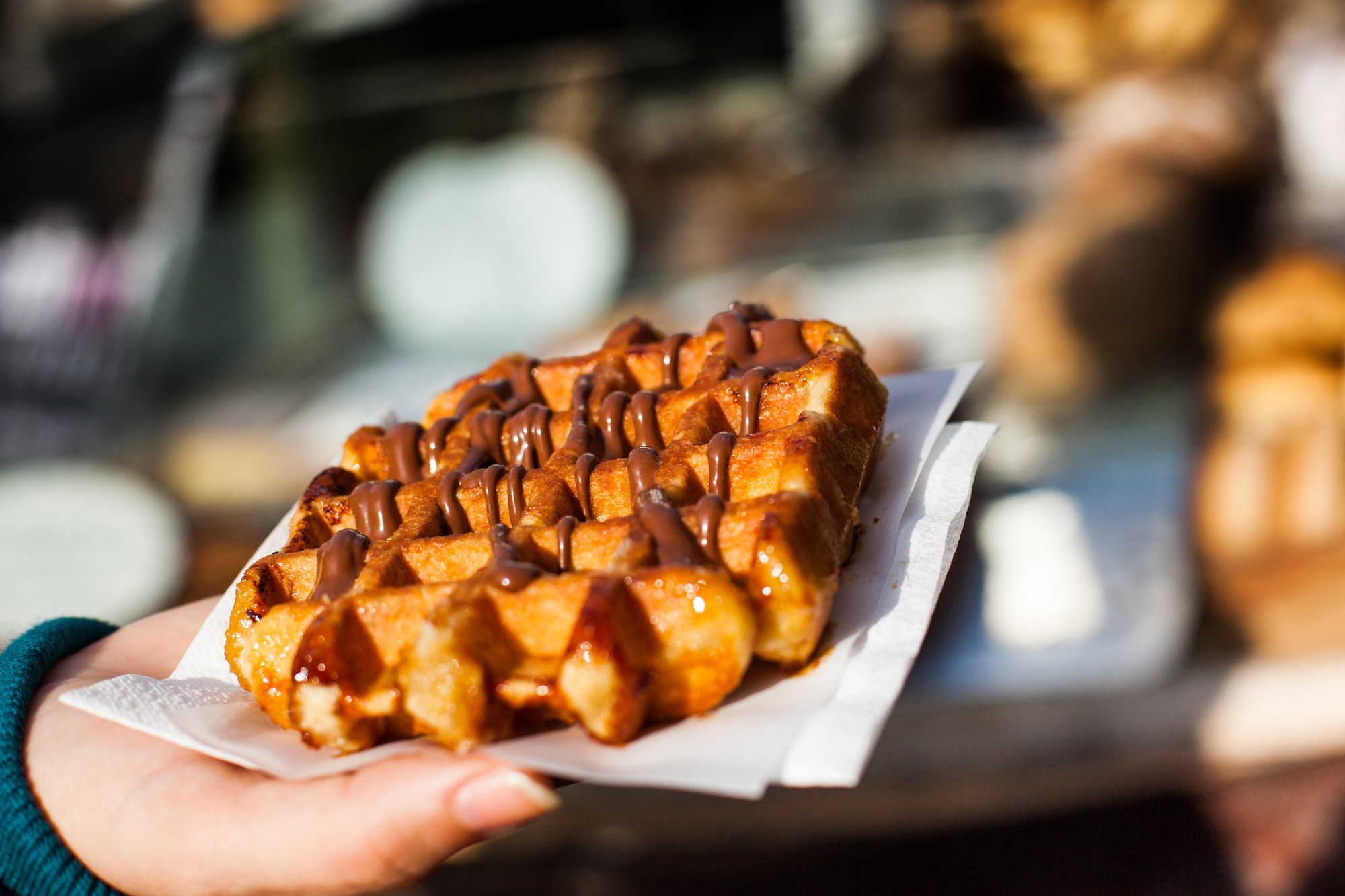 Waffles are a must-try street food in Ghent, Belgium
