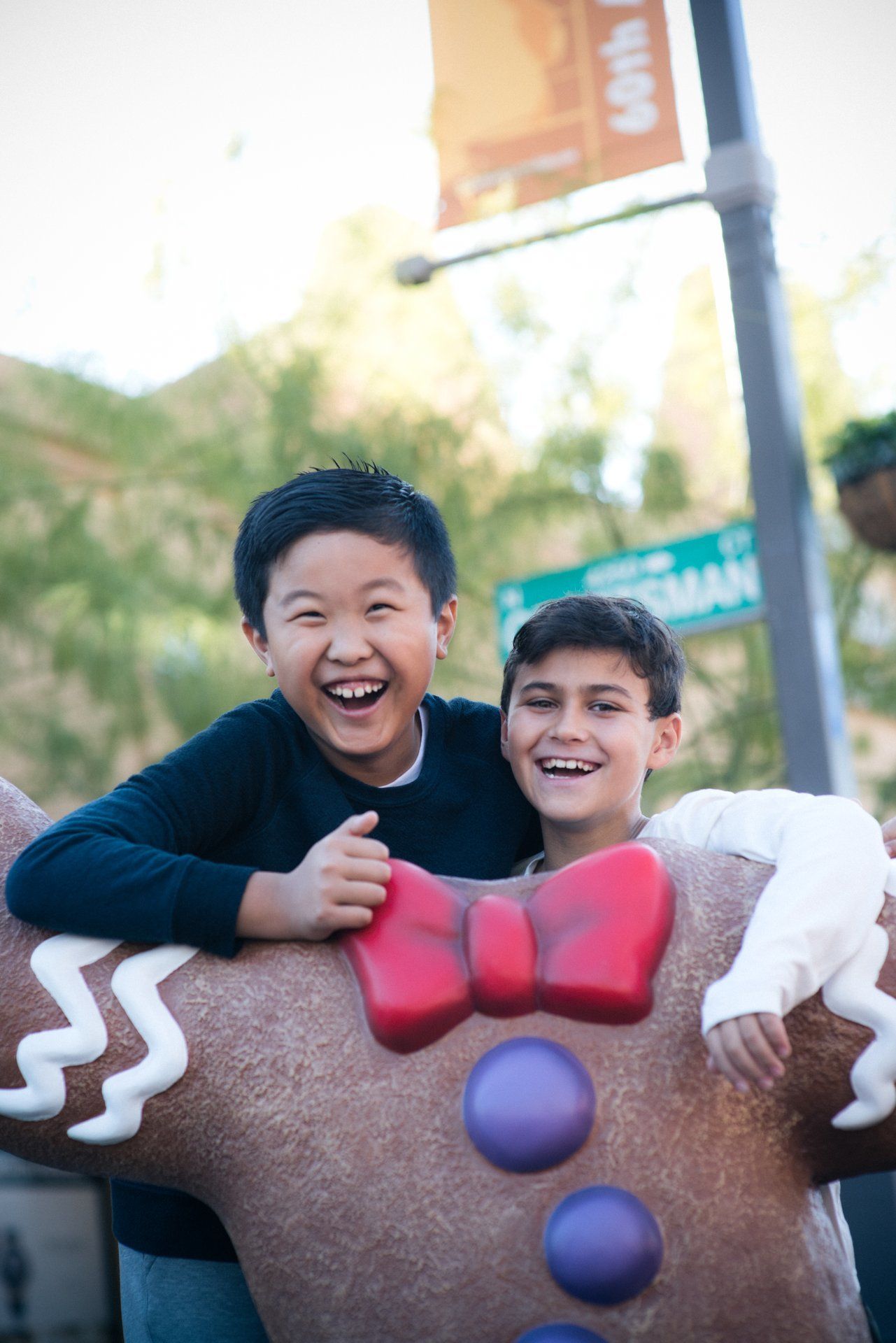 Pose with a gingerbread man in Old Town Scottsdale during Scottsdazzle