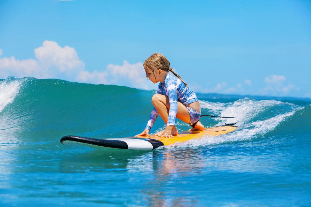 Maui is an ideal place to learn to surf with kids