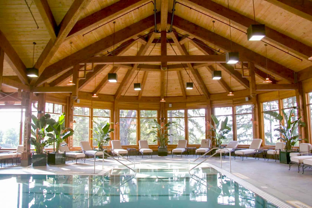 Indoor pool at Mohonk Mountain House, surrounded by trees