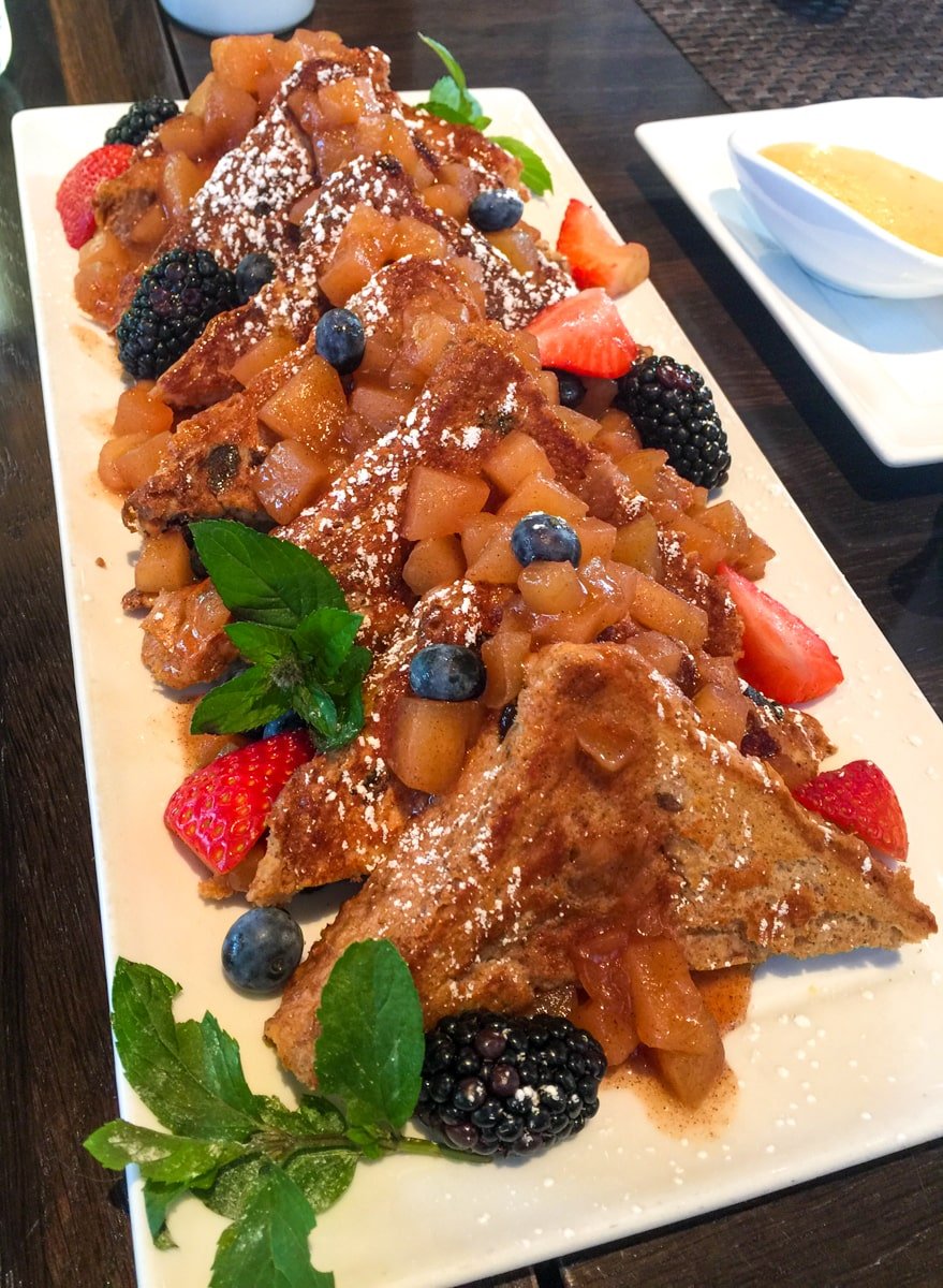 French Toast for a crowd topped with mascarpone cheese and fresh berries at The Sebastian