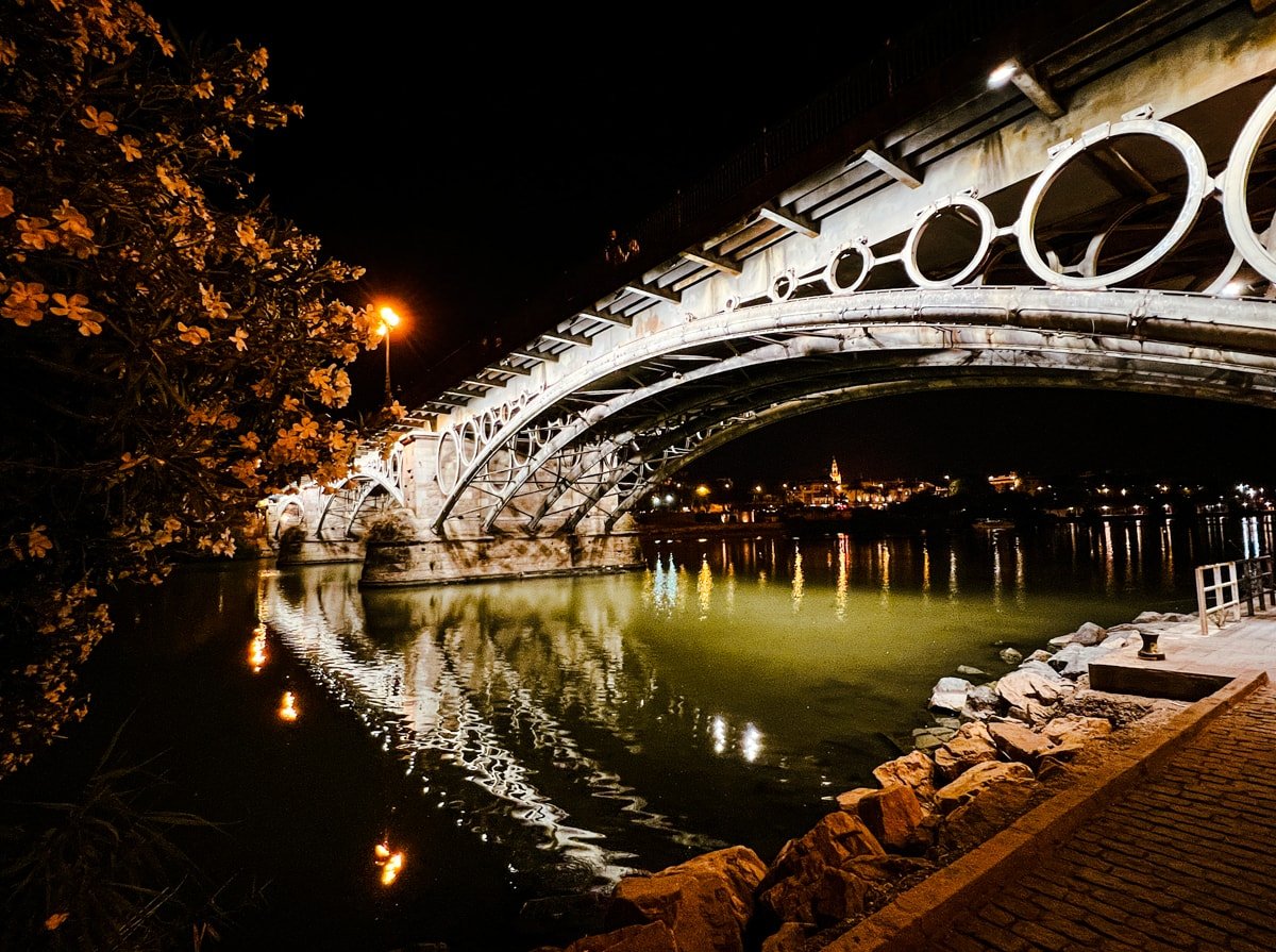 Puente de Isabel II at night