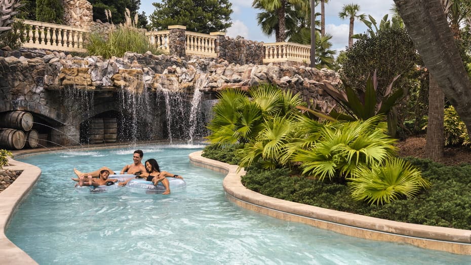 Family with kids on Lazy River at Four Seasons Resort Orlando at Walt Disney World 