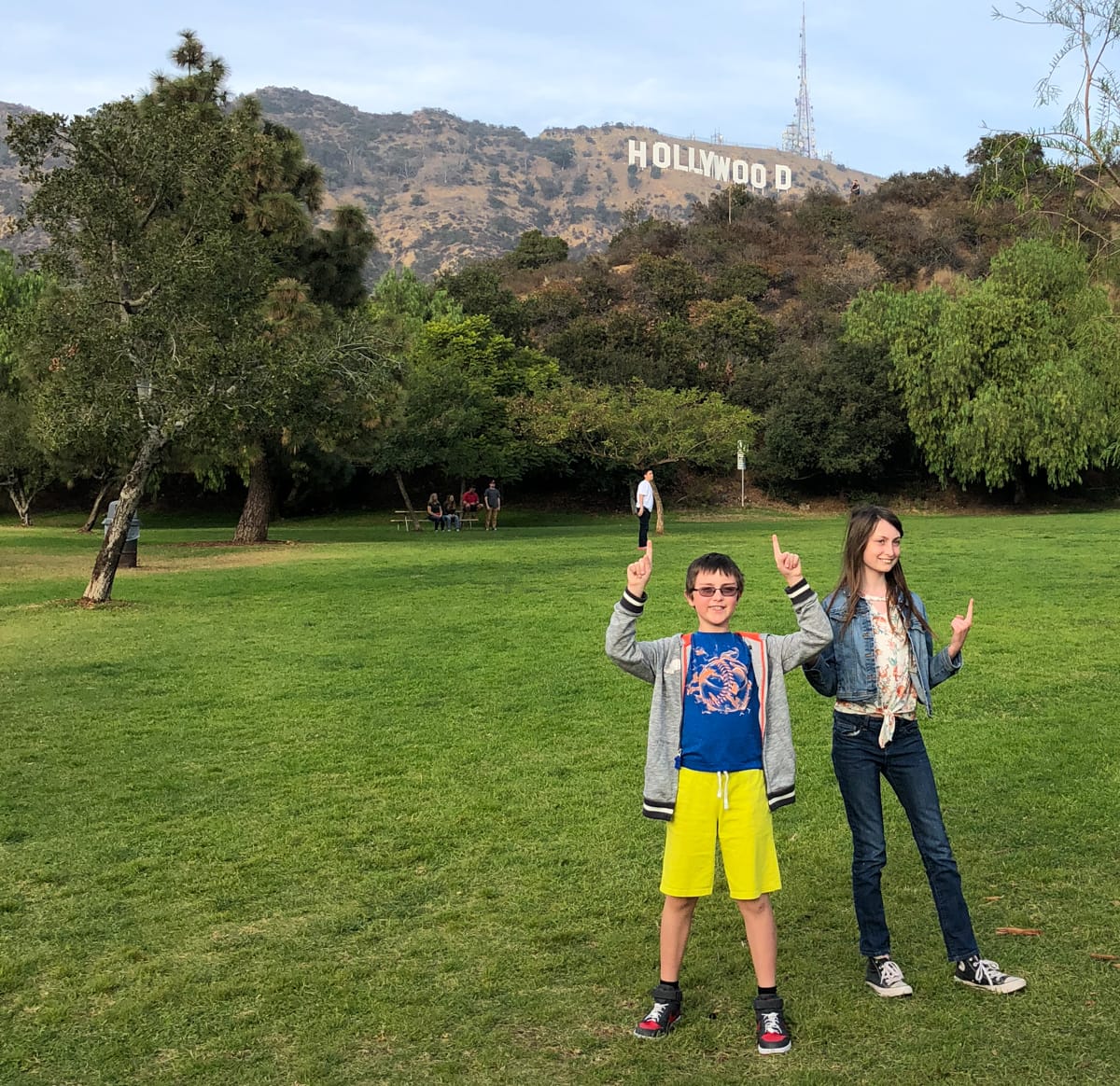 My kids posing with the Hollywood Sign in Griffith Park
