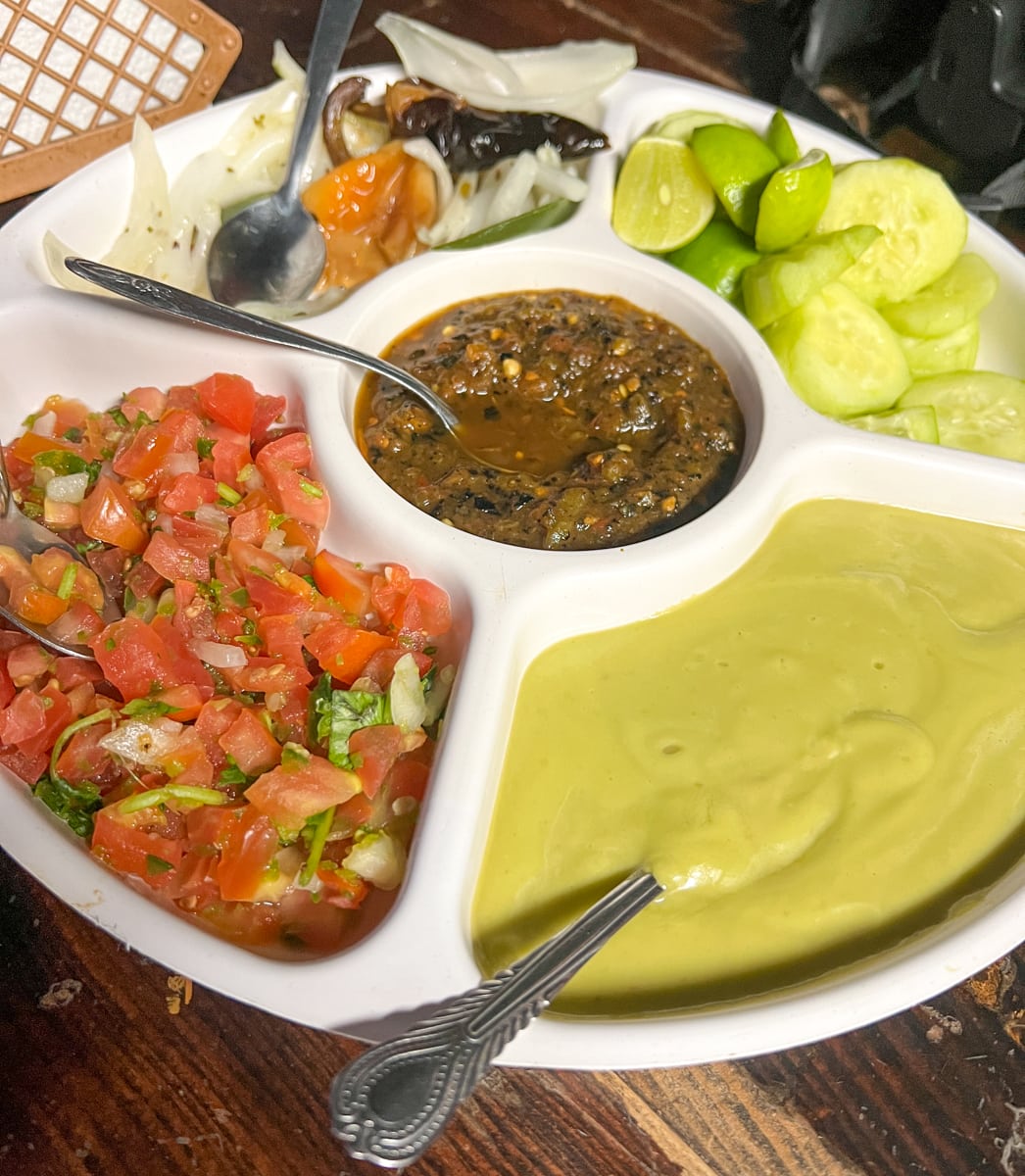 Salsas and toppings at Asadero Super Burro 