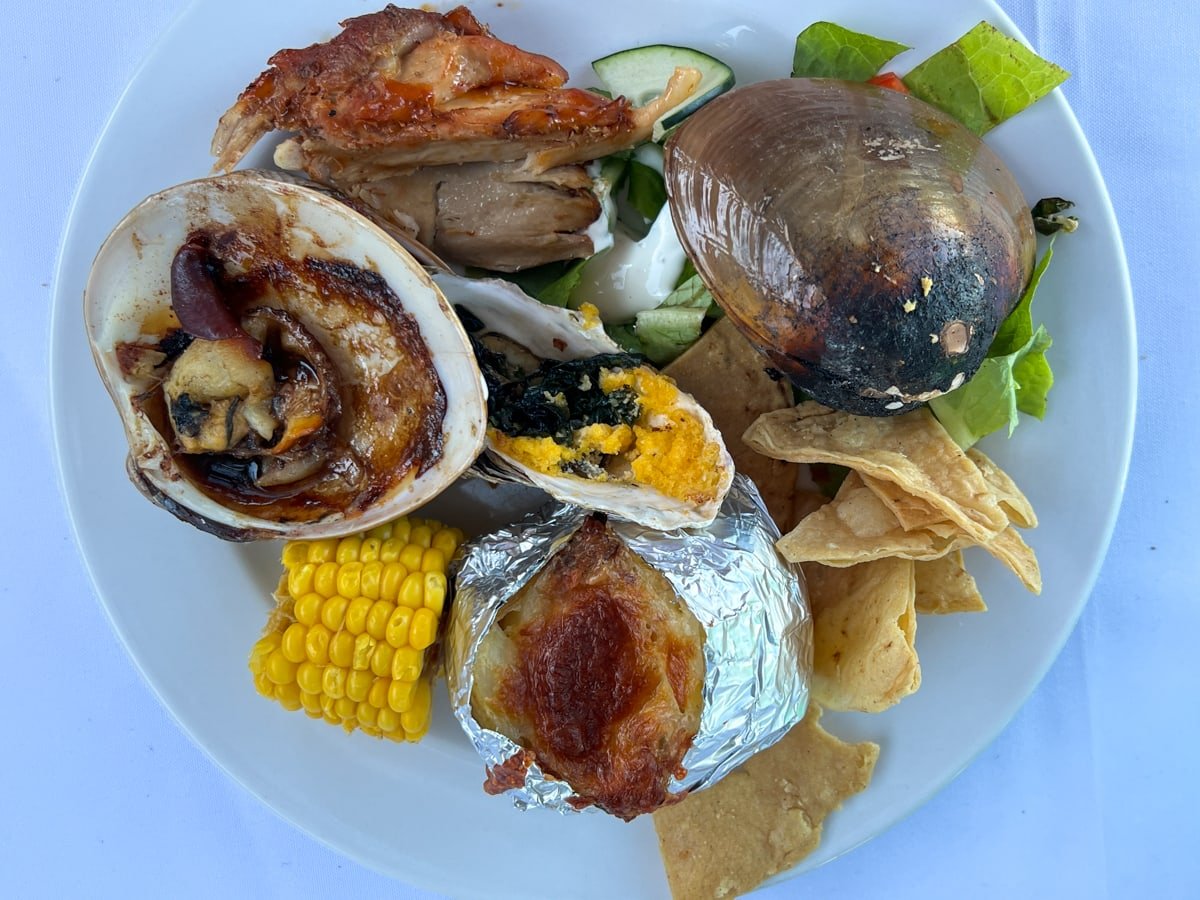 Array of good things to eat at the Hotel Oasis clambake