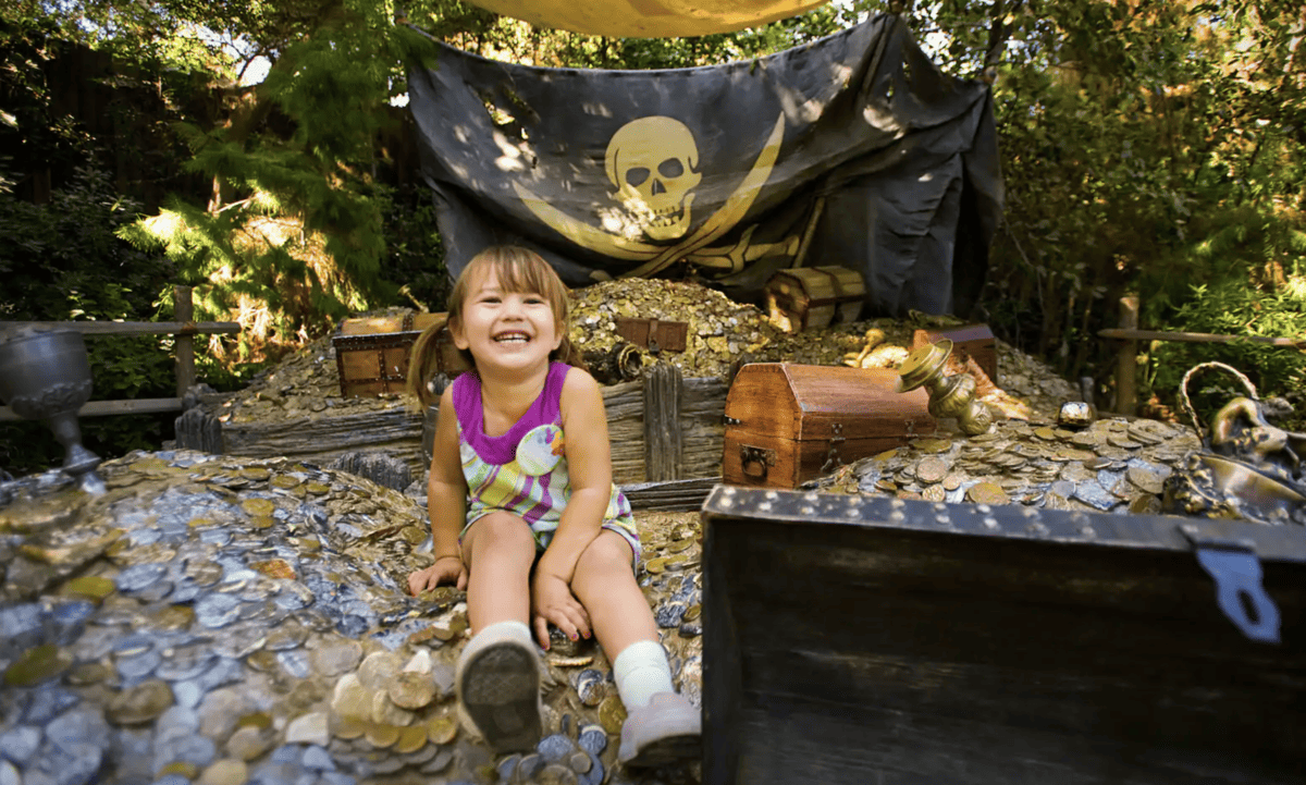 Pirate's Lair on Tom Sawyer's Island with a toddler
