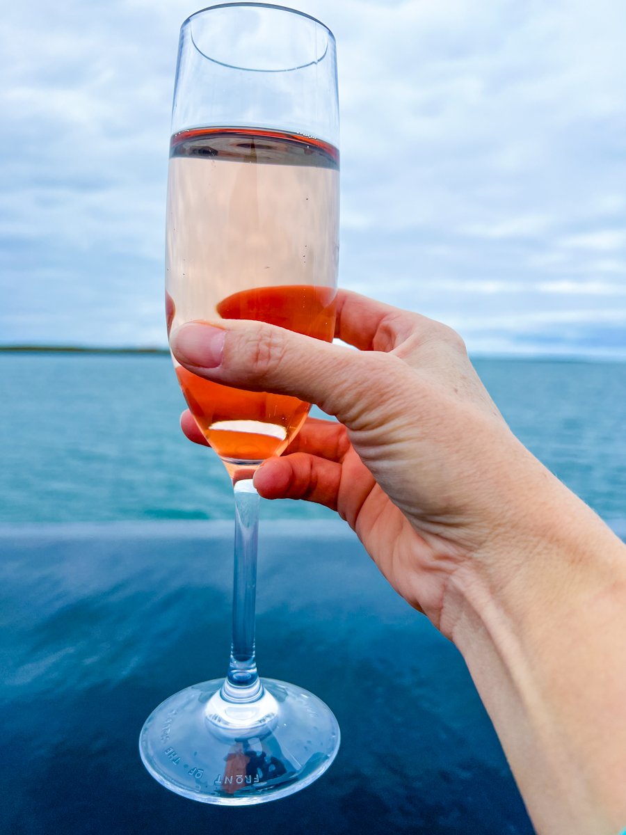 A glass of bubbly rosé at Sky Lagoon