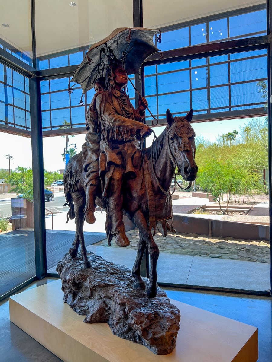 Amerindian bronze sculpture at the entrance of Museum of the West 